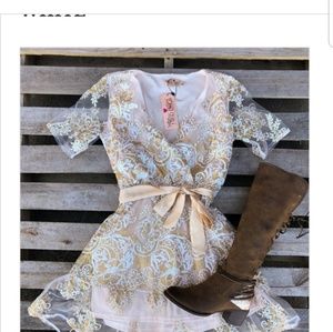 Gold pink and white dress.